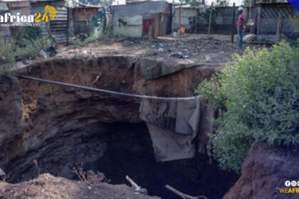 This photograph captured by Jacques Nelles on April 3rd, 2023, showcases a colossal sinkhole located in Boksburg's Angelo informal settlement. The sinkhole, which has developed over time, now presents a considerable danger to the settlement's inhabitants, potentially jeopardizing their safety.